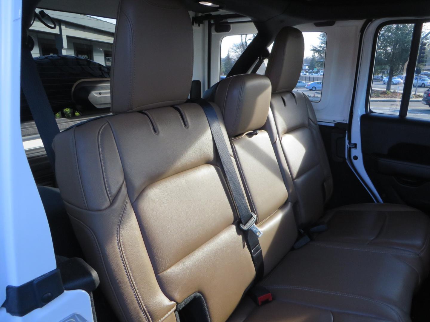 2020 White /TAN Jeep Wrangler Unlimited Rubicon (1C4HJXFG8LW) with an 3.6L V6 DOHC 24V FFV engine, 6A transmission, located at 2630 Grass Valley Highway, Auburn, CA, 95603, (530) 508-5100, 38.937893, -121.095482 - 3" Zone offroad suspension system, Fox adventure series shocks, rocksliders, Teraflex HD tire relocation, Mopar HD tailgate hinge, 17" KMC wheels, and 37" BFG KO2 tires. - Photo#55